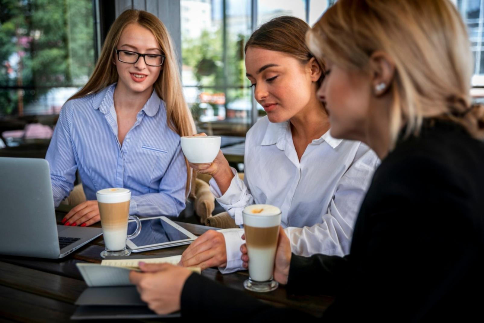 Financial planning discussion with documents and calculator
